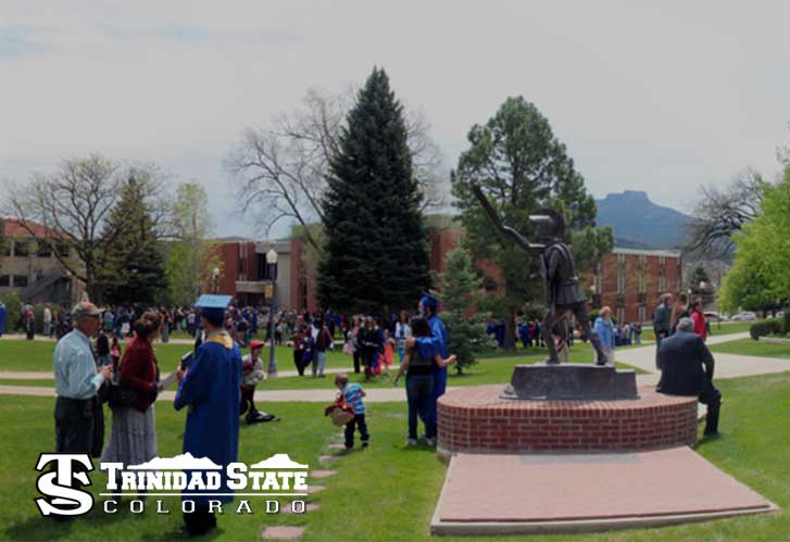 Photo of students graduating in front of Trinidad State Junior College