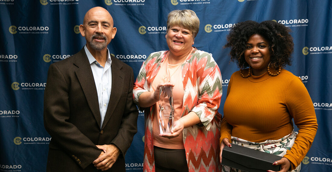 Photo of CCCS Awardees posing for the camera with award