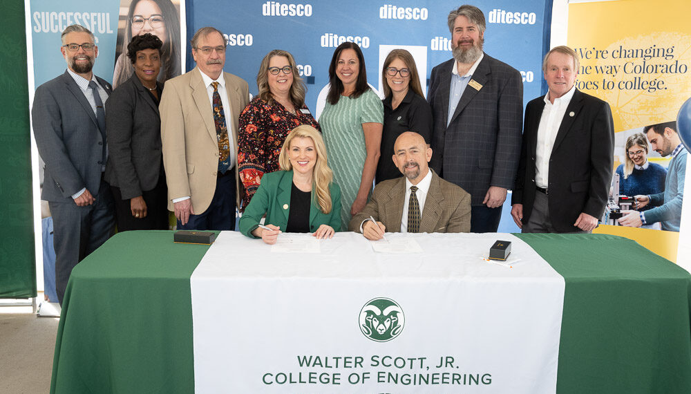 Amy Parsons, President of Colorado State University, and Joe Garcia, Chancellor of the Colorado Community College System, sign an articulation agreement between the Community College System and CSU's Civil Engineering Department at an event hosted by Ditesco, a Fort Collins engineering company. May 16, 2023