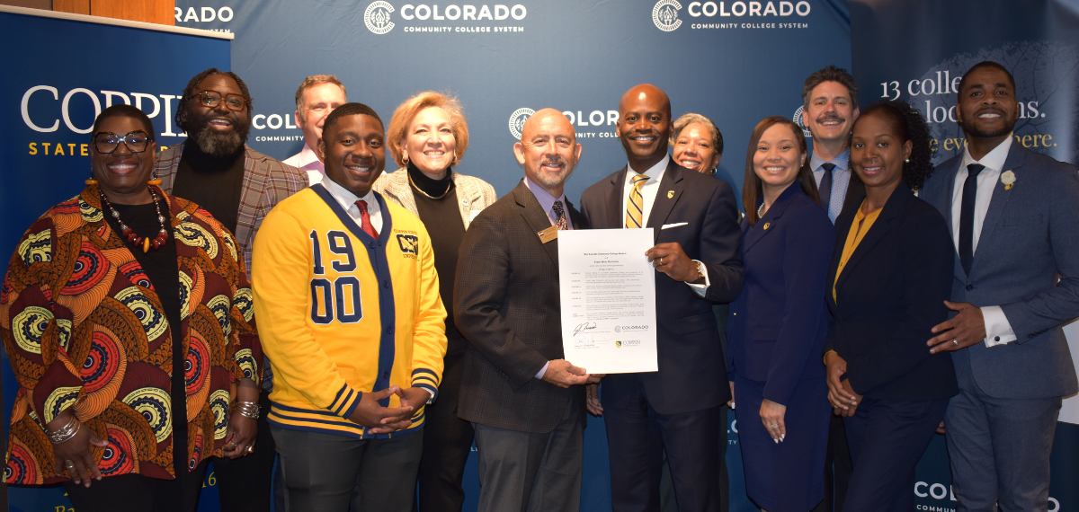 Leader from the Colorado Community College System and Coppin State University celebrate the signing of a new transfer agreement.